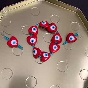Beautiful heart evil eye bracelet and earrings!